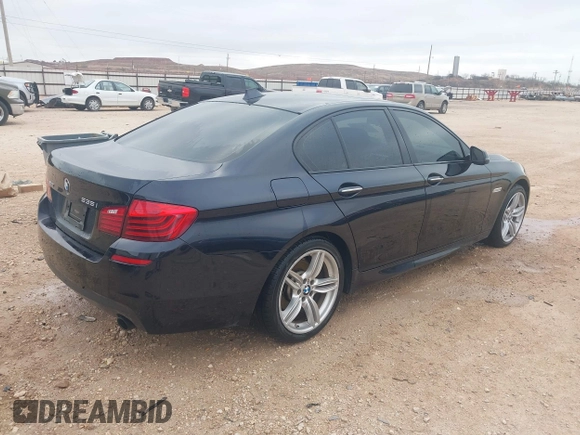 2014 BMW 5 Series 535i xDrive with VIN WBA5B3C58ED531677, listed as a IAAI auction lot 41684139 with 132,560 mi miles and . Bid and sale history available at carsss.com. Image 4.