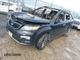 2013 Kia Sorento SX with VIN 5XYKWDA20DG364370, listed as a IAAI auction lot 41108533 with 146,124 mi miles and . Bid and sale history available at DreamBid. Image 2.