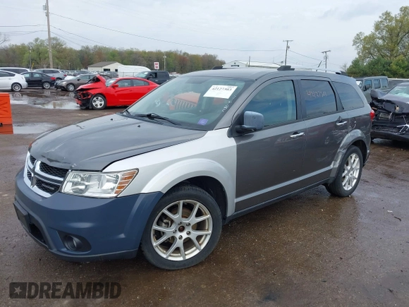 2012 Dodge Journey Crew z VIN 3C4PDCDG9CT146593, wystawiony jako IAAI lot #42127303 z przebiegiem 137 861 mil mil oraz . Historia ofert i sprzedaży dostępna na DreamBid. Obrazek 6.
