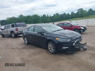 2017 Ford Fusion SE z VIN 3FA6P0HD8HR114178, wystawiony jako IAAI lot #42186809 z przebiegiem 180 982 mil mil oraz . Historia ofert i sprzedaży dostępna na DreamBid. Obrazek 1.