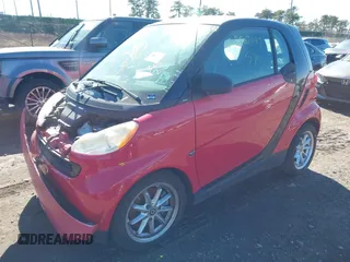 2009 Smart fortwo Pure with VIN WMEEJ31X29K305678, listed as a IAAI auction lot 41691476 with Not Provided miles and . Bid and sale history available at DreamBid. Image 2.