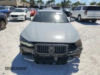 2022 BMW 4 Series 430i z VIN WBA63AV04NFM02881, wystawiony jako Copart lot #49373595 z przebiegiem 33 722 mil mil oraz Szkoda całkowita • Salvage title. Historia ofert i sprzedaży dostępna na DreamBid. Obrazek 5.