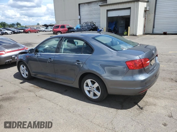 2013 Volkswagen Jetta TDI w/Premium with VIN 3VWLL7AJ3DM205297, listed as a Copart auction lot 56916045 with 157,049 mi miles and Salvage title. Bid and sale history available at DreamBid. Image 2.