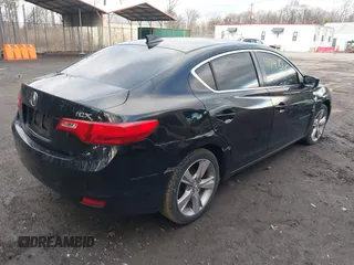 2014 Acura ILX with VIN 19VDE1F32EE007212, listed as a IAAI auction lot 41748681 with 102,710 mi miles and . Bid and sale history available at DreamBid. Image 4.