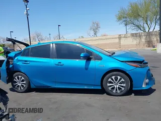 2021 Toyota Prius LE with VIN JTDKAMFP7M3169633, listed as a IAAI auction lot 41986170 with 55,925 mi miles and . Bid and sale history available at DreamBid. Image 14.