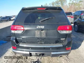 2018 Jeep Grand Cherokee Summit with VIN 1C4RJFJG1JC211047, listed as a IAAI auction lot 41133865 with 66,588 mi miles and . Bid and sale history available at DreamBid. Image 16.