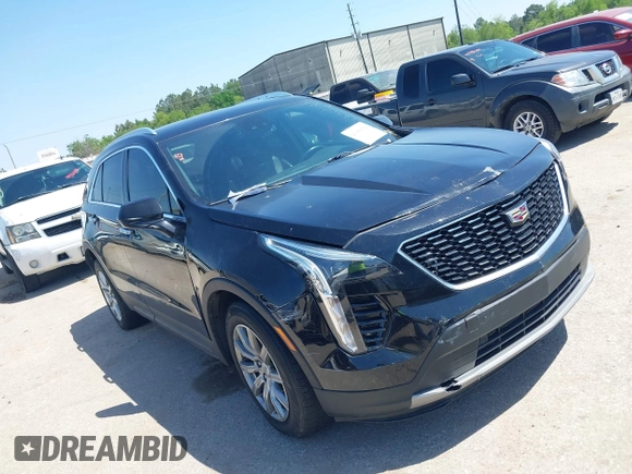 2019 Cadillac XT4 FWD Premium Luxury z VIN 1GYFZCR48KF141478, wystawiony jako IAAI lot #41988092 z przebiegiem 53 970 mil mil oraz . Historia ofert i sprzedaży dostępna na DreamBid. Obrazek 1.
