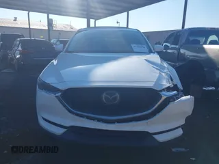 2017 Mazda CX-5 Grand Touring with VIN JM3KFBDL6H0164993, listed as a IAAI auction lot 41450556 with 97,733 mi miles. Bid and sale history available at carsss.com. Image 12.
