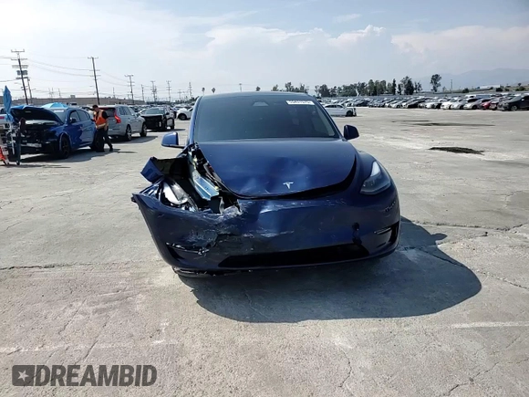 2024 Tesla Model Y with VIN 7SAYGDED0RF102479, listed as a Copart auction lot 55431975 with 23,989 mi miles and Salvage title. Bid and sale history available at DreamBid. Image 15.