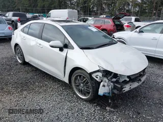 2021 Toyota Corolla XSE with VIN 5YFT4MCE8MP089733, listed as a IAAI auction lot 41826159 with 57,799 mi miles. Bid and sale history available at carsss.com. Image 1.