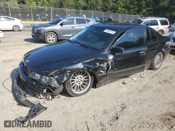 2002 BMW 5 Series 540i with VIN WBADN53412GF70808, listed as a Copart auction lot 69833574 with 193,044 mi miles and Salvage Title. Bid and sale history available at carsss.com. Image 1.