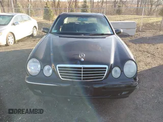 2000 Mercedes-Benz E-Class with VIN WDBJF65J1YB058351, listed as a IAAI auction lot 41834603 with 100,525 mi miles. Bid and sale history available at carsss.com. Image 12.