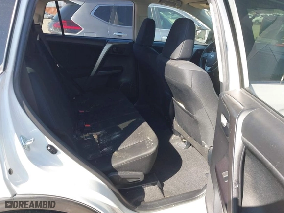 2016 Toyota RAV4 LE with VIN JTMZFREV7GJ096390, listed as a IAAI auction lot 41599268 with 94,568 mi miles. Bid and sale history available at carsss.com. Image 8.