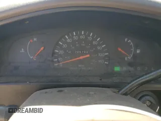 1999 Toyota Tacoma z VIN 4TAVL52N1XZ513889, wystawiony jako Copart lot #50007235 z przebiegiem 225 799 mil mil oraz Szkoda całkowita • Salvage title. Historia ofert i sprzedaży dostępna na DreamBid. Obrazek 9.