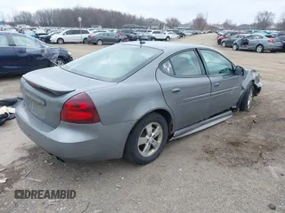 2007 Pontiac Grand Prix with VIN 2G2WP552371221110, listed as a IAAI auction lot 42011006 with 274,300 mi miles. Bid and sale history available at carsss.com. Image 4.