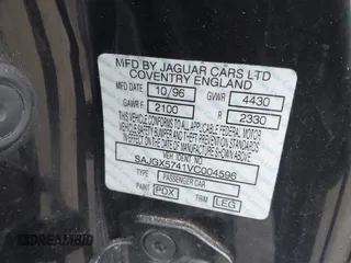1997 Jaguar XK with VIN SAJGX5741VC004596, listed as a IAAI auction lot 41588751 with 188,607 mi miles and . Bid and sale history available at DreamBid. Image 9.