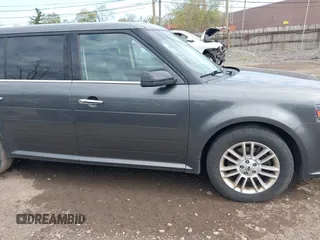 2016 Ford Flex SEL z VIN 2FMGK5C82GBA21945, wystawiony jako IAAI lot #42206498 z przebiegiem 141 320 mil mil oraz . Historia ofert i sprzedaży dostępna na DreamBid. Obrazek 13.