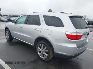 2013 Dodge Durango Crew z VIN 1C4RDJDGXDC637572, wystawiony jako IAAI lot #41922757 z przebiegiem 110 941 mil mil oraz . Historia ofert i sprzedaży dostępna na DreamBid. Obrazek 3.