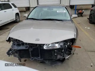 2002 Oldsmobile Aurora z VIN 1G3GR64H224169066, wystawiony jako Copart lot #44636565 z przebiegiem 69 419 mil mil oraz Szkody całkowita. Historia ofert i sprzedaży dostępna na DreamBid. Obrazek 5.