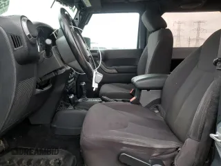 2014 Jeep Wrangler Sport с VIN 1C4AJWAG1EL117219, выставлен на аукционе Copart как лот 59696355 с пробегом 105 865 миль миль и Списание • Salvage title. История ставок и продаж доступна на DreamBid. Изображение 7.