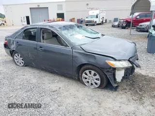 2009 Toyota Camry LE z VIN 4T1BK46KX9U594987, wystawiony jako IAAI lot #42039029 z przebiegiem 156 812 mil mil oraz . Historia ofert i sprzedaży dostępna na DreamBid. Obrazek 1.
