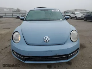 2012 Volkswagen Beetle 2.5L PZEV with VIN 3VWJP7AT1CM652433, listed as a Copart auction lot 85989164 with 115,406 mi miles and Salvage Title. Bid and sale history available at carsss.com. Image 5.