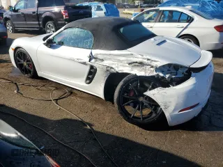2017 Porsche 718 Boxster z VIN WP0CA2A89HS221297, wystawiony jako Copart lot #68283993 z przebiegiem 9668 mil mil oraz . Historia ofert i sprzedaży dostępna na DreamBid. Obrazek 2.