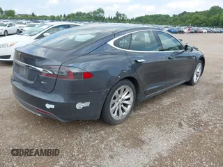 2016 Tesla Model S 90D with VIN 5YJSA1E25GF129482, listed as a IAAI auction lot 42588913 with 101,790 mi miles and . Bid and sale history available at DreamBid. Image 4.
