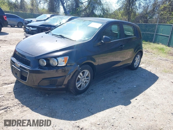 2014 Chevrolet Sonic LT with VIN 1G1JC6SB6E4210561, listed as a IAAI auction lot 42073197 with 100,945 mi miles. Bid and sale history available at carsss.com. Image 2.