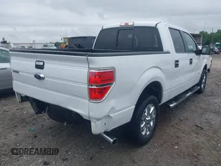 2014 Ford F-150 XL with VIN 1FTFW1CT3EFC39602, listed as a IAAI auction lot 42340659 with 61,464 mi miles and . Bid and sale history available at DreamBid. Image 4.