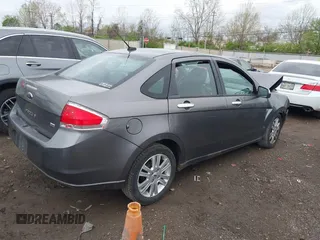 2010 Ford Focus SEL with VIN 1FAHP3HN8AW240255, listed as a IAAI auction lot 42072158 with 182,974 mi miles. Bid and sale history available at carsss.com. Image 4.