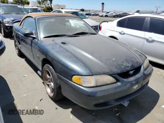 1998 Ford Mustang GT with VIN 1FAFP45X9WF103156, listed as a Copart auction lot 61475414 with 79,714 mi miles and Salvage Title. Bid and sale history available at carsss.com. Image 4.