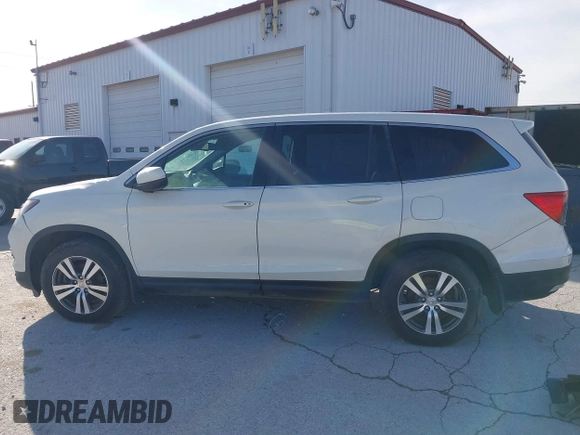 2016 Honda Pilot EX-L with VIN 5FNYF5H5XGB016152, listed as a IAAI auction lot 41820023 with 210,474 mi miles and . Bid and sale history available at DreamBid. Image 15.
