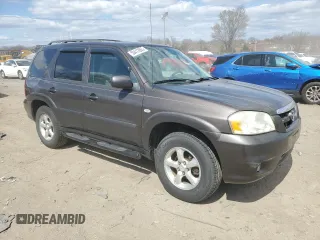 2006 Mazda Tribute i with VIN 4F2YZ92Z76KM26192, listed as a Copart auction lot 50412865 with 152,851 mi miles and Salvage Title. Bid and sale history available at carsss.com. Image 4.