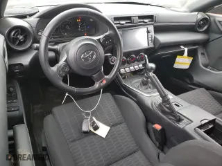 2024 Toyota GR86 with VIN JF1ZNBB16R9752214, listed as a Copart auction lot 42644345 with 12,238 mi miles and Salvage Title. Bid and sale history available at carsss.com. Image 8.