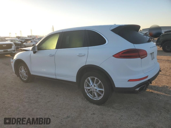 2016 Porsche Cayenne with VIN WP1AA2A26GKA15645, listed as a Copart auction lot 48148415 with 81,402 mi miles and Salvage Title. Bid and sale history available at carsss.com. Image 2.