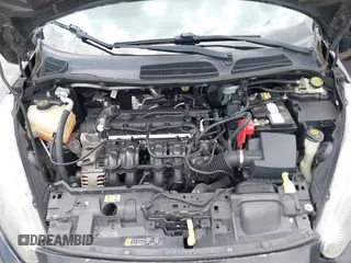 2014 Ford Fiesta SE z VIN 3FADP4BJ0EM216922, wystawiony jako IAAI lot #42255776 z przebiegiem 87 371 mil mil oraz . Historia ofert i sprzedaży dostępna na DreamBid. Obrazek 10.