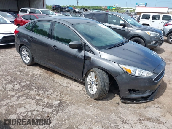 2018 Ford Focus SE with VIN 1FADP3F20JL312395, listed as a IAAI auction lot 42110335 with 110,720 mi miles and . Bid and sale history available at DreamBid. Image 1.