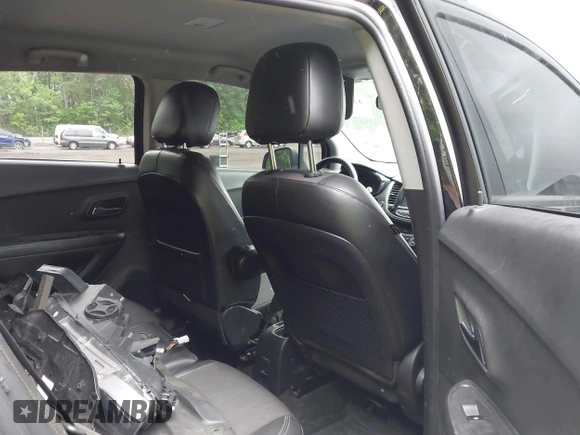 2021 Chevrolet Trax LT with VIN KL7CJLSB5MB322117, listed as a IAAI auction lot 42161568 with 63,344 mi miles and . Bid and sale history available at DreamBid. Image 8.