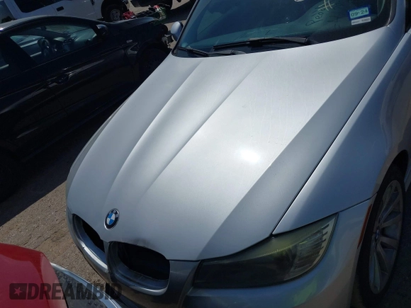 2011 BMW 3 Series 328i with VIN WBAPH7G57BNM58073, listed as a IAAI auction lot 41883231 with 144,539 mi miles. Bid and sale history available at carsss.com. Image 10.