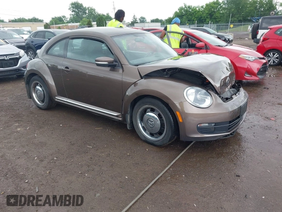 2012 Volkswagen Beetle 2.5L PZEV with VIN 3VWJP7AT2CM638265, listed as a IAAI auction lot 42512449 with 137,129 mi miles and . Bid and sale history available at DreamBid. Image 1.