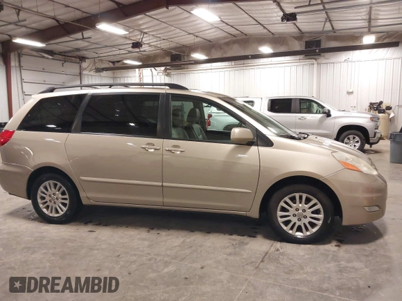 2009 Toyota Sienna XLE with VIN 5TDZK22CX9S236850, listed as a IAAI auction lot 42303935 with 201,583 mi miles and . Bid and sale history available at DreamBid. Image 13.