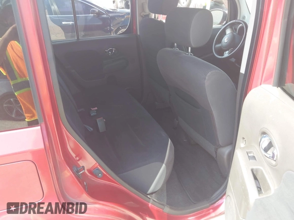 2009 Nissan Cube S z VIN JN8AZ28RX9T117772, wystawiony jako IAAI lot #42310747 z przebiegiem 147 582 mil mil oraz . Historia ofert i sprzedaży dostępna na DreamBid. Obrazek 8.