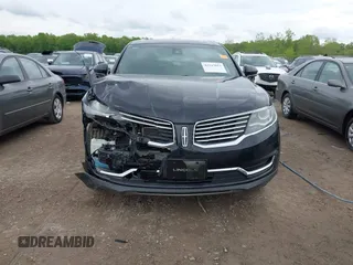 2017 Lincoln MKX Reserve with VIN 2LMPJ8LR8HBL51883, listed as a IAAI auction lot 42243012 with 84,544 mi miles and . Bid and sale history available at DreamBid. Image 12.
