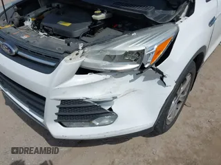 2014 Ford Escape SE with VIN 1FMCU9GXXEUC50365, listed as a IAAI auction lot 41891030 with 70,399 mi miles. Bid and sale history available at carsss.com. Image 6.
