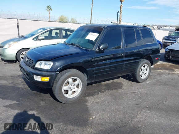 1999 Toyota RAV4 with VIN JT3GP10V9X7058125, listed as a IAAI auction lot 42056633 with 247,015 mi miles and . Bid and sale history available at DreamBid. Image 2.