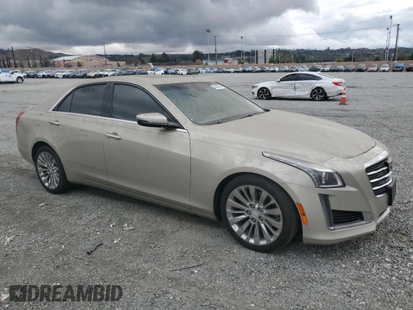 2016 Cadillac CTS Luxury Collection RWD with VIN 1G6AR5SX5G0120942, listed as a Copart auction lot 44390635 with 27,177 mi miles and Salvage Title. Bid and sale history available at DreamBid. Image 4.