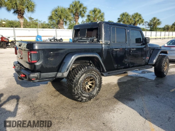 2020 Jeep Gladiator Rubicon z VIN 1C6JJTBG5LL101185, wystawiony jako Copart lot #83012014 z przebiegiem Nie podano mil oraz Nie do naprawy • Non repairable. Historia ofert i sprzedaży dostępna na DreamBid. Obrazek 3.