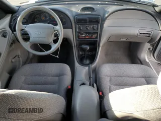 1997 Ford Mustang with VIN 1FALP4045VF120213, listed as a Copart auction lot 85335614 with 71,225 mi miles and Salvage Title. Bid and sale history available at carsss.com. Image 8.