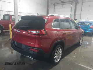 2015 Jeep Cherokee Limited with VIN 1C4PJLDS0FW585595, listed as a IAAI auction lot 41371621 with 102,108 mi miles and . Bid and sale history available at DreamBid. Image 4.